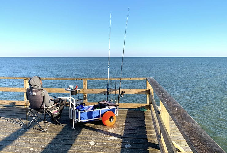 Fishing off the end of the Kure Beach Pier