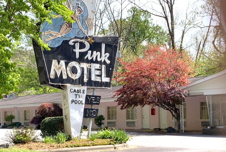 Cherokee Nostalgic Road Signs Pink Hotel