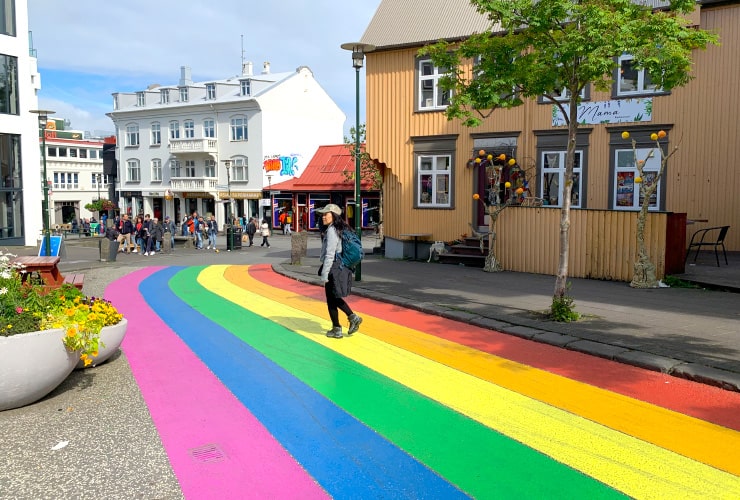 Ramie Strolling Across Reykjavik's Rainbow Street