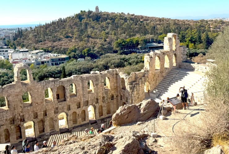 View of the Philopappos Monument resting atop Mouseion Hill from above the Odeon of Herodes Atticus